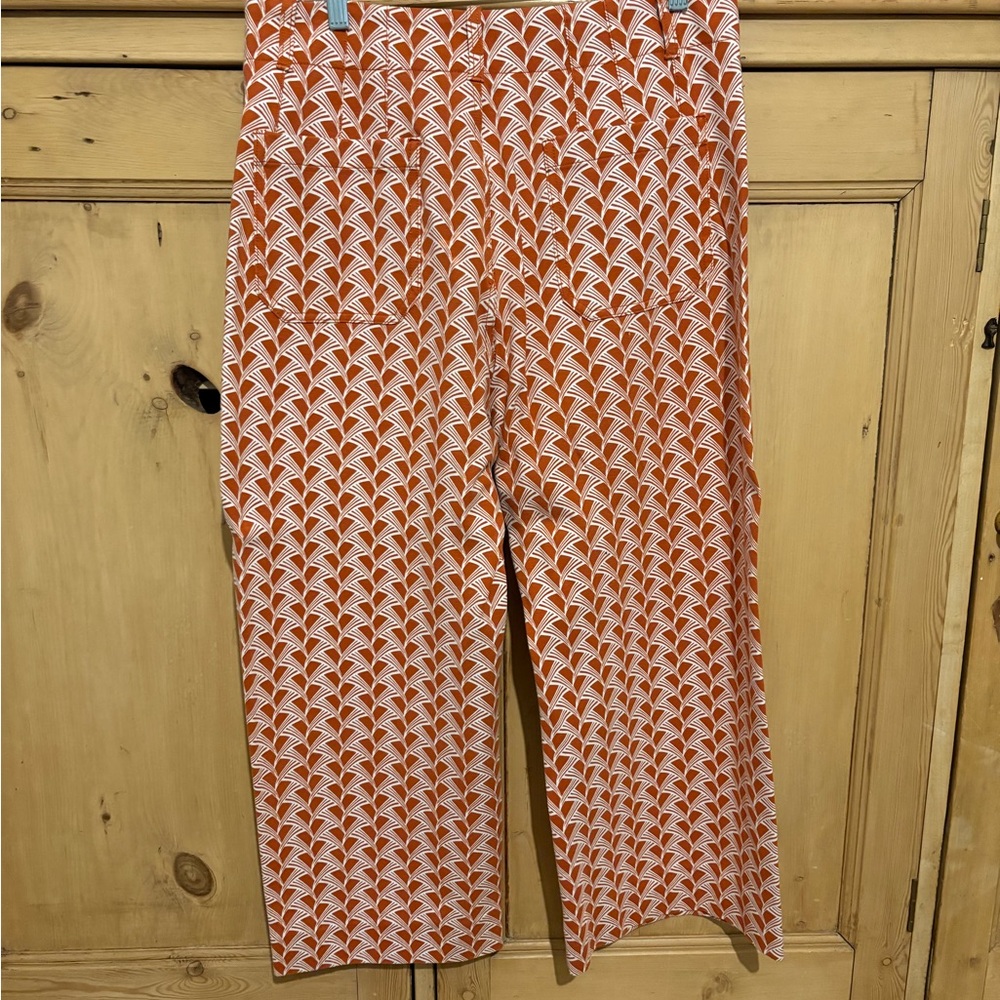 Anthropologie Orange and White Patterned Flare Pants